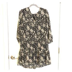 3/4’ sleeve black dress with white floral pattern